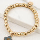 Envy Gold Bead Stretch Bracelet with Grey Open Clover