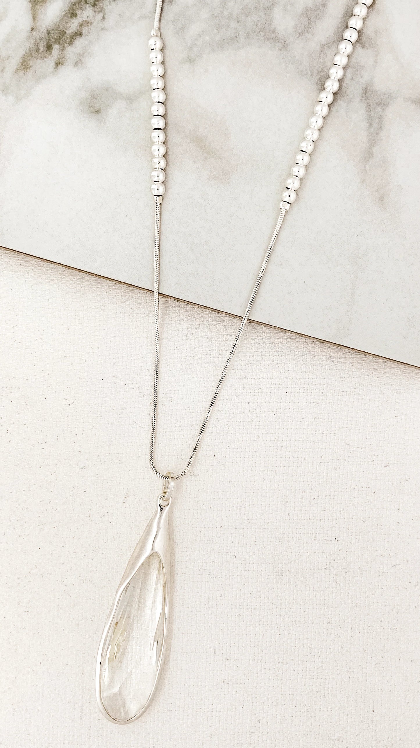 Envy Long silver necklace with smokey grey drop glass pendant