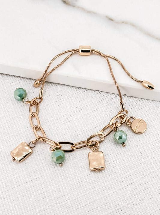 Envy Gold Charm Bracelet with Green Glass Beads