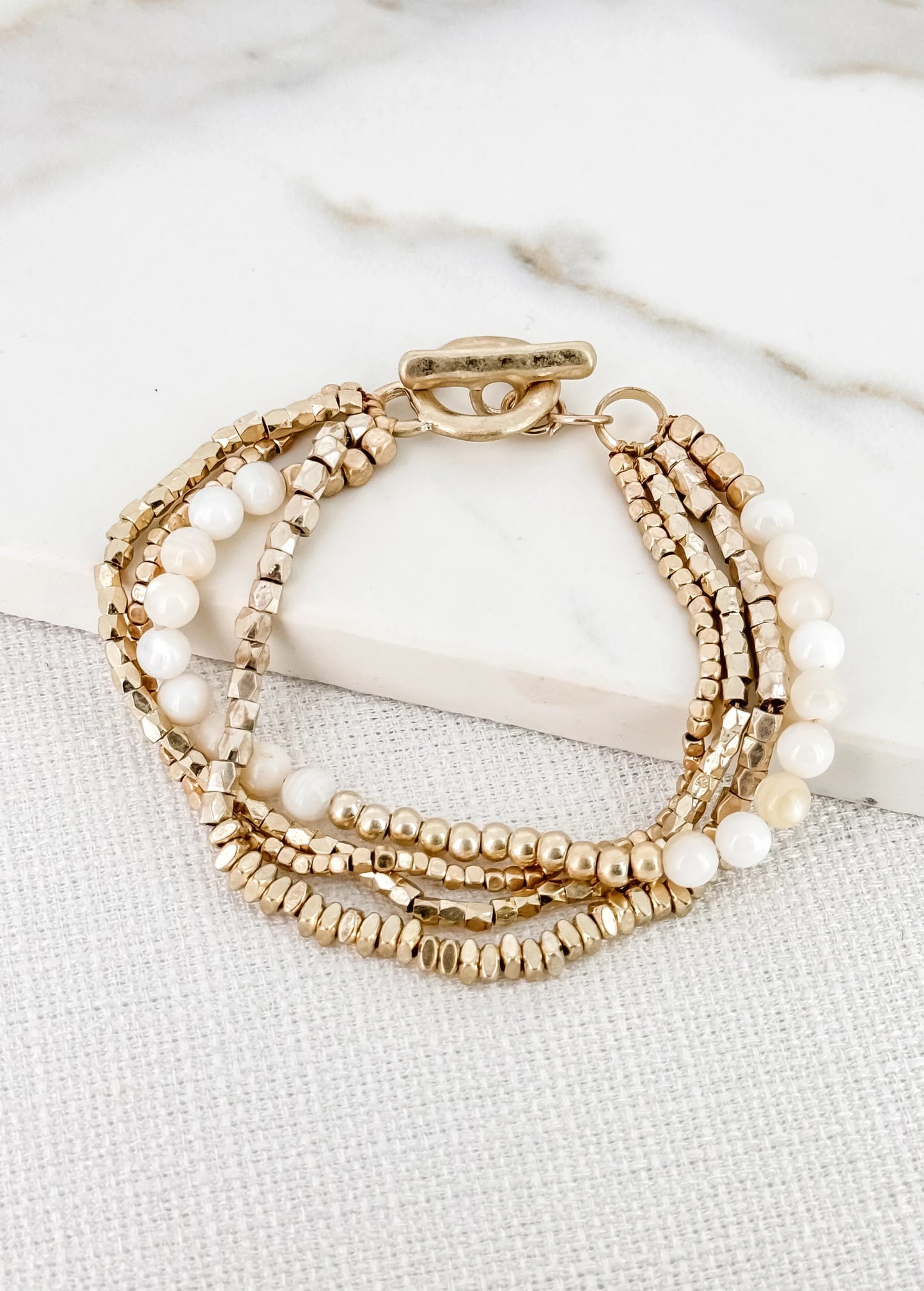 Envy Layered Gold Bracelet with Cream Semi Precious Beads and T-bar Clasp