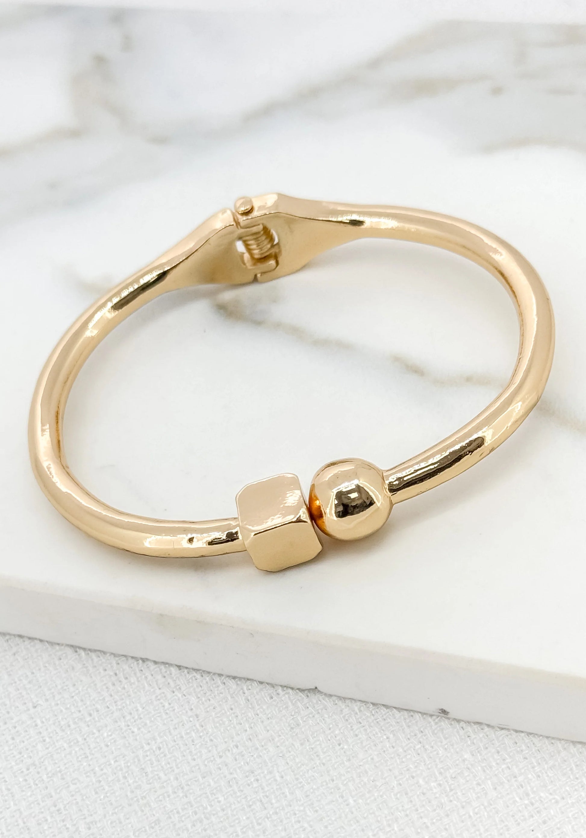 Envy Gold Hinged Bangle with a Ball and Square Design