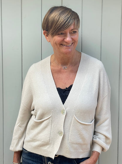 Soft knit cardigan with front pockets in oatmeal